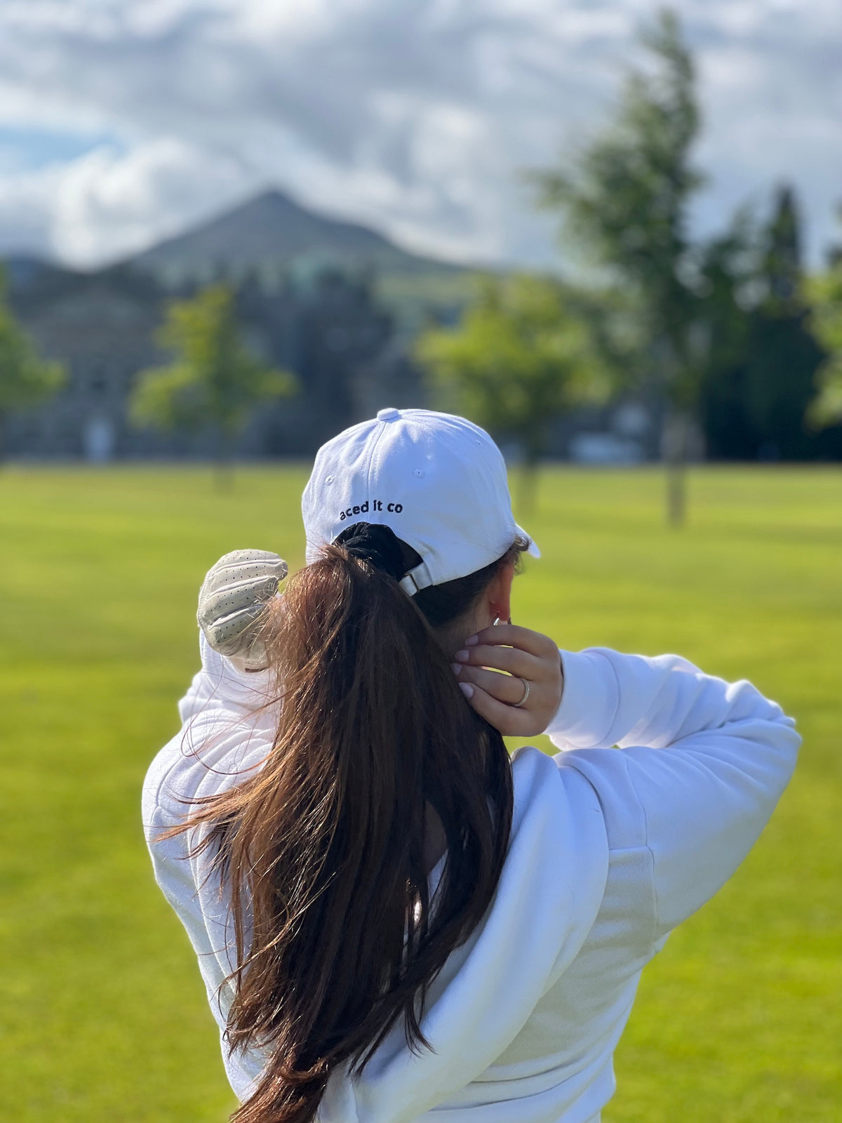 Golf Is Therapy golf cap by Aced It Co., in white.