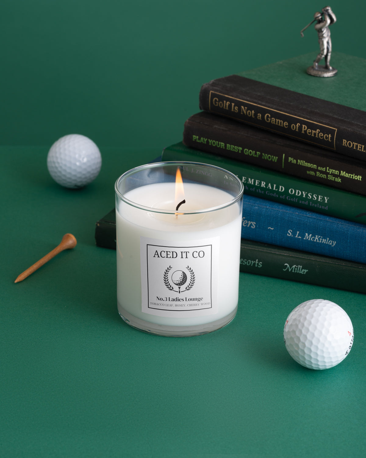 Ladies Lounge scented candle by Aced It Co., featuring notes of smoky tobacco leaf, honey, and cherry wood.