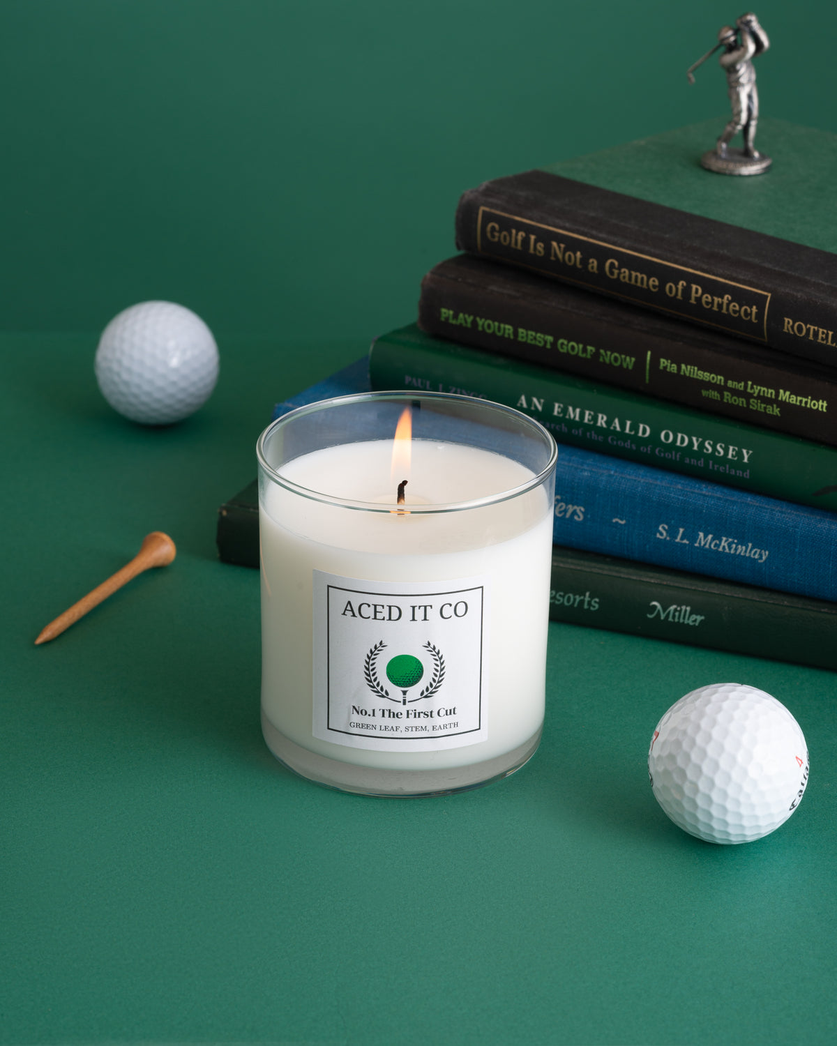 The First Cut scented golf candle by Aced It Co., inspired by the fresh-cut grass and greenery of a golf course.
